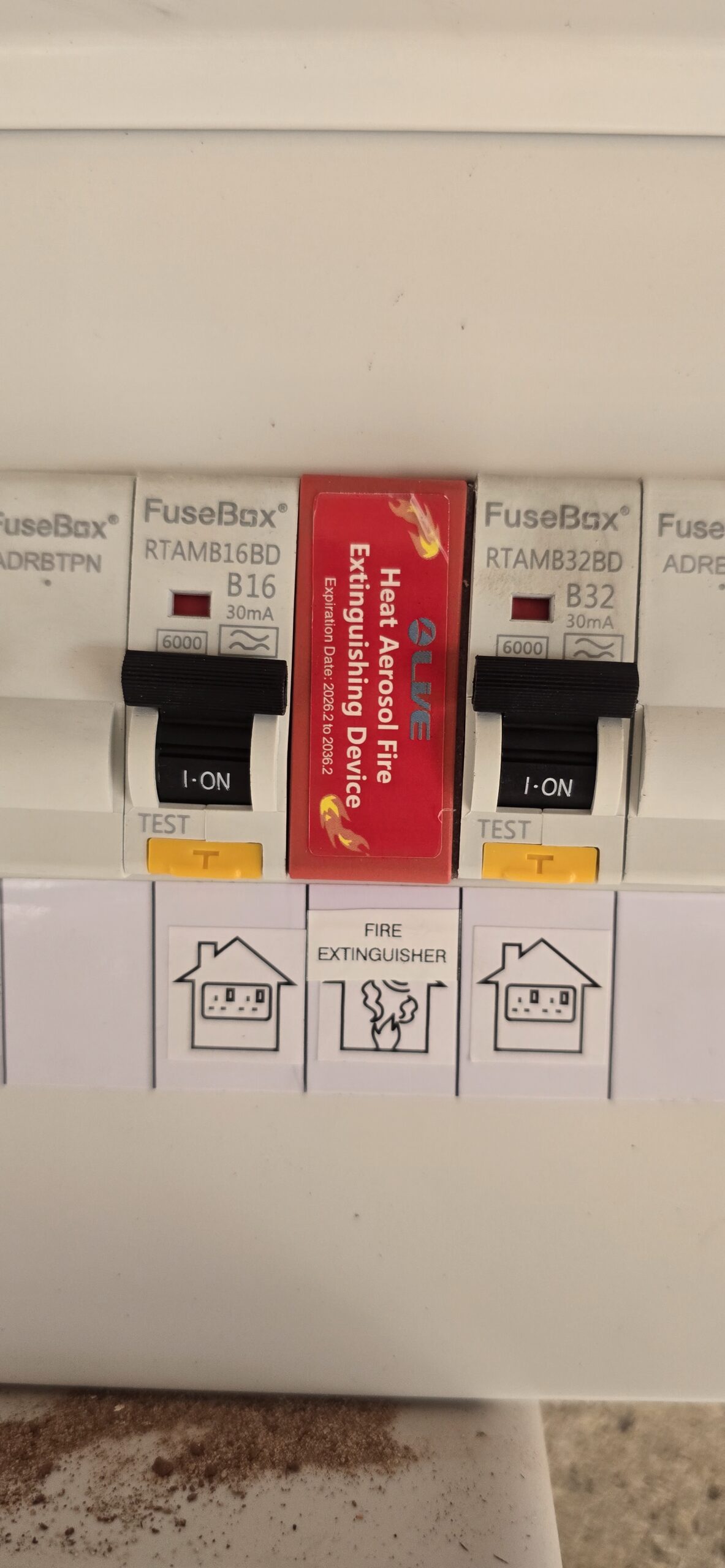 Modern metal consumer unit with RCBOs and DIN rail fire suppression device fitted by NextPhase Energy, electrician Goole, East Yorkshire