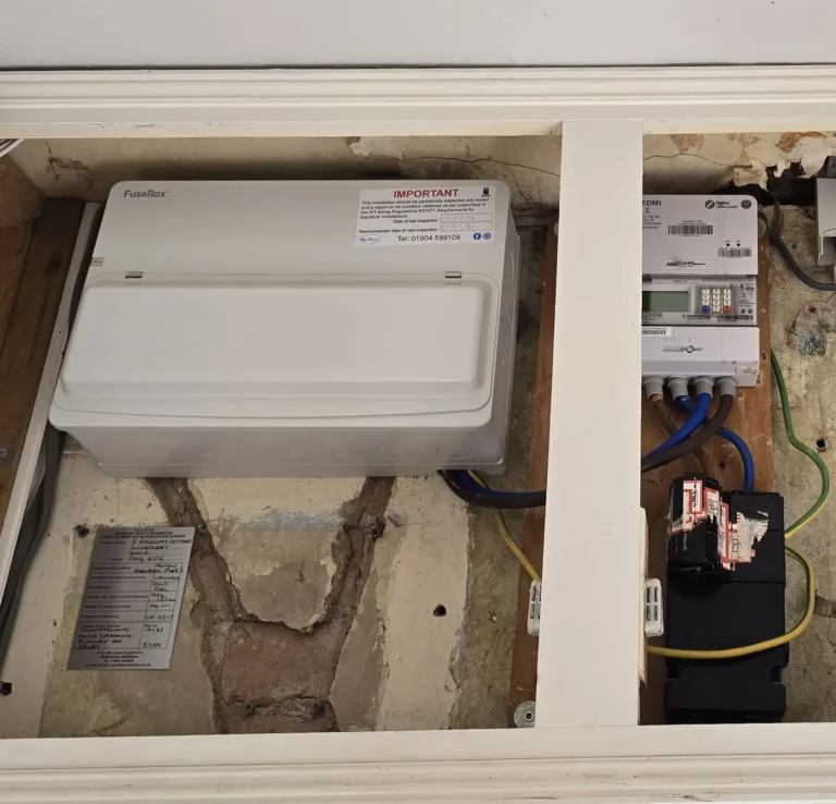 A newly installed consumer unit next to the meter at a property in Goole