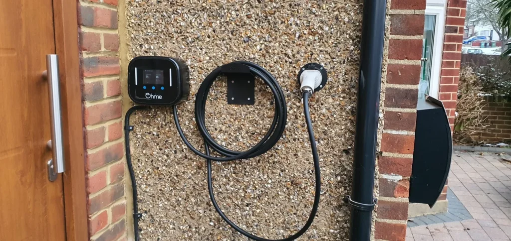 An Ohme EV charger installed beside the front door of a house in Selby