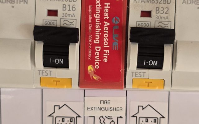 Modern metal consumer unit with RCBOs and DIN rail fire suppression device fitted by NextPhase Energy, electrician Goole, East Yorkshire