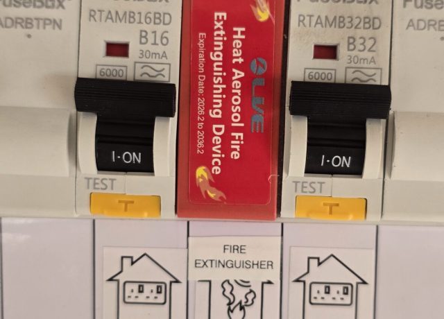 Modern metal consumer unit with RCBOs and DIN rail fire suppression device fitted by NextPhase Energy, electrician Goole, East Yorkshire